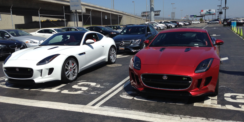The F-Type next to its cleaner, less eggy brother.